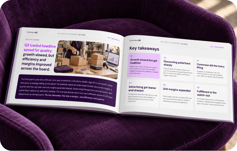 A book open to a page with text and an image of people packing boxes.